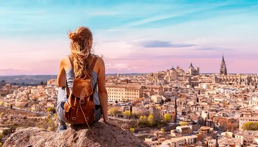 Woman overlooking city in Spain